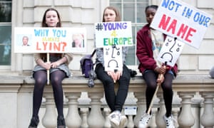 Young protesters demonstrate at the gates of Downing Street on Friday night.