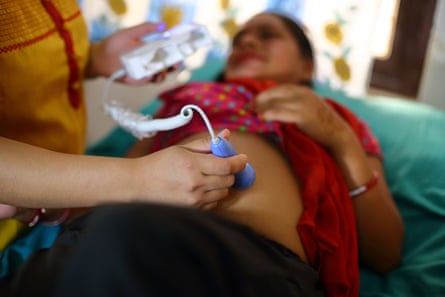 Checkup on a pregnant woman at a health centre in the Ramechhap district, some 100km east of Kathmandu