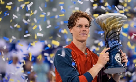 Jannik Sinner poses with the Rookwood Cup after winning the Cincinnati Open final