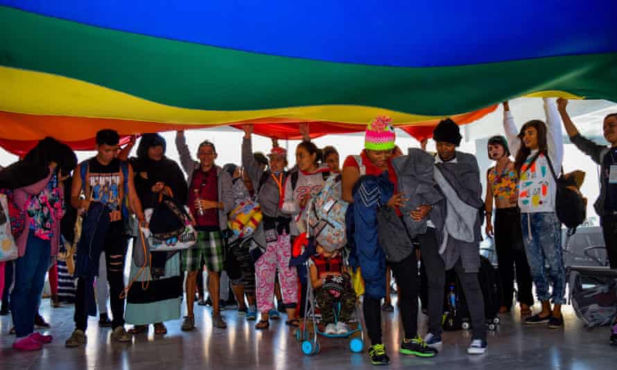 LGBT migrants arrive in Tijuana, Mexico, ahead of the first caravan of Central Americans en route to the US on 11 November.