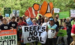 Climate activists protest about the planned loan to Adani in Melbourne on Monday