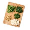 Felicity Cloake’s borek 02c. roughly chop the fresh herbs and stir them into the spinach with the nuts, if using, and crumbled cheese. (This can all be done well in advance, because, once made, the filling will keep well in the fridge for a few days.)