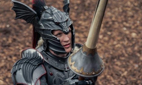 Matt Smith holding a lance clad in full armour as Daemon Targaryen