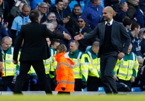 Guardiola shakes hands with Puel after the final whistle.