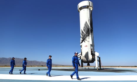 The crew including William Shatner (second from left) on the landing pad of Blue Origin’s New Shepard