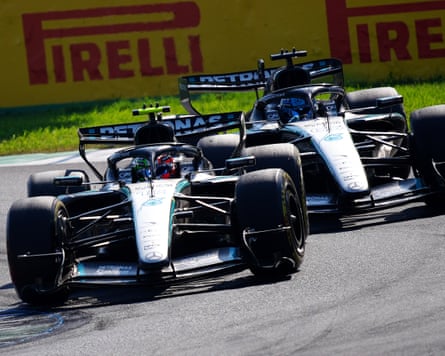 Kimi Antonelli (left) battles with teammate George Russell during the Italian Grand Prix