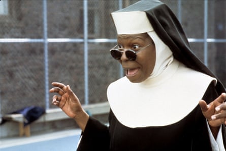 Goldberg dressed as a nun, with sunglasses, as the singing Deloris in Sister Act.