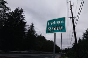 Sign saying Indian River with 'Land' written over word River