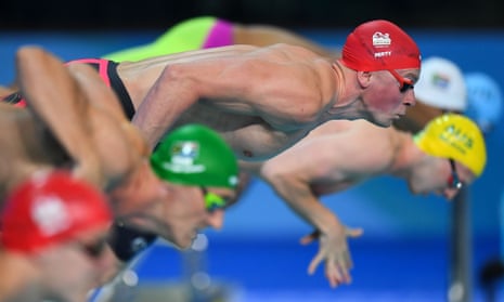 Adam Peaty dives into his 100m breaststroke semi-final.