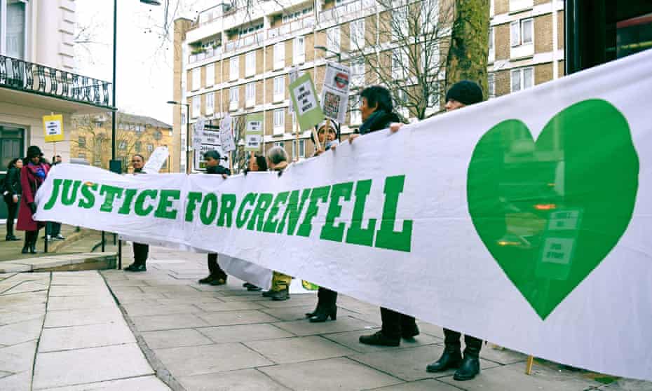 Protesters outside the Grenfell Tower public inquiry in London.