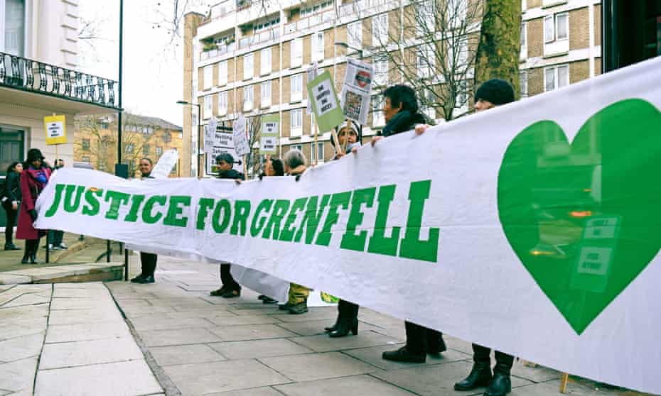 Protesters outside the Grenfell Tower public inquiry in London