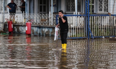 A man wades through flood waters in Istanbul, Turkey.
