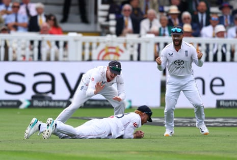 England’s Jordan Cox holds onto the ball after taking the catch to dismiss Pakistan’s captain.