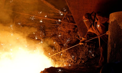An employee carries out operations during the production of iron at Yenakiyeve Iron and Steel Works in the course of Russia-Ukraine conflict in Yenakiyeve in the Donetsk region, Russian-controlled Ukraine.