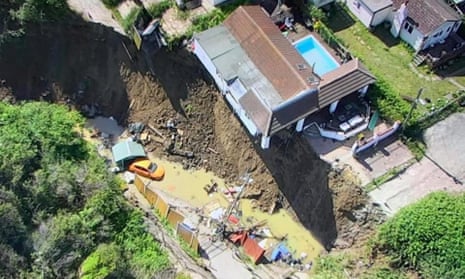 The house was left partially suspended over a sheer drop after a cliff collapse.