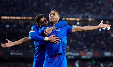 Cyriel Dessers celebrates scoring Rangers’ second goal with James Tavernier.