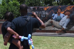 Attendees take in an art installation on Greenwood Avenue during the Juneteenth Festival n Tulsa, Oklahoma