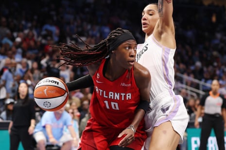Rhyne Howard looks to pass under pressure from Golden StateâÂÂs Gabby Williams during the first quarter of Game 6 of the WNBA finals in Atlanta on Thursday.
