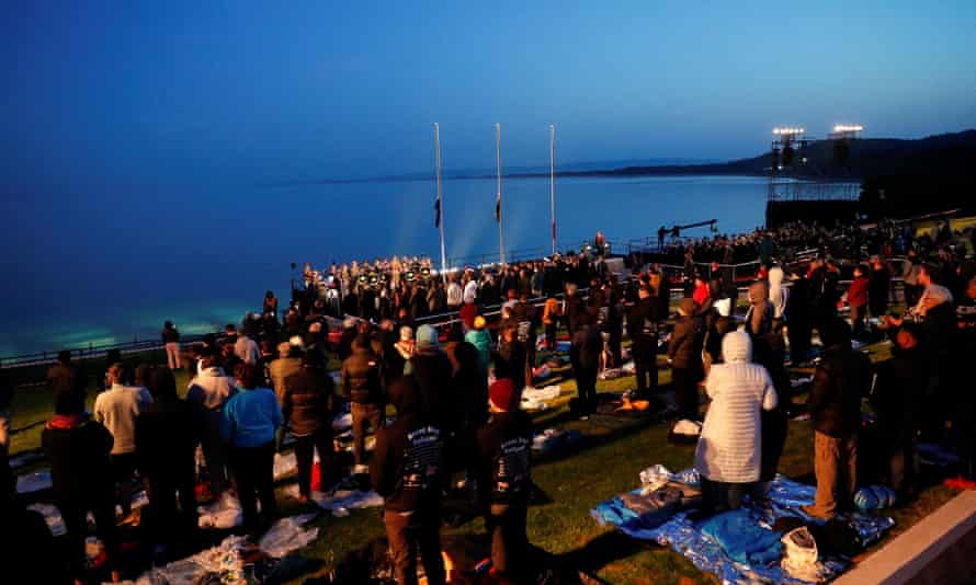 Visitors from Australia and New Zealand attend a dawn ceremony at Anzac Cove in the Gallipoli peninsula in Canakkale, Turkey on Monday.