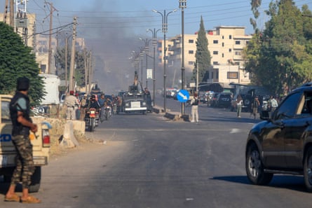 Soldiers on a city street near the predominantly Druze city of Sweida.