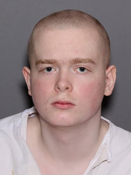 A teenage boy with his head shaved