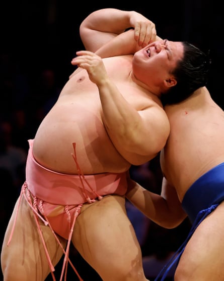 Ura (left) seems in pain but goes on to beat Fujinokawa in their fight