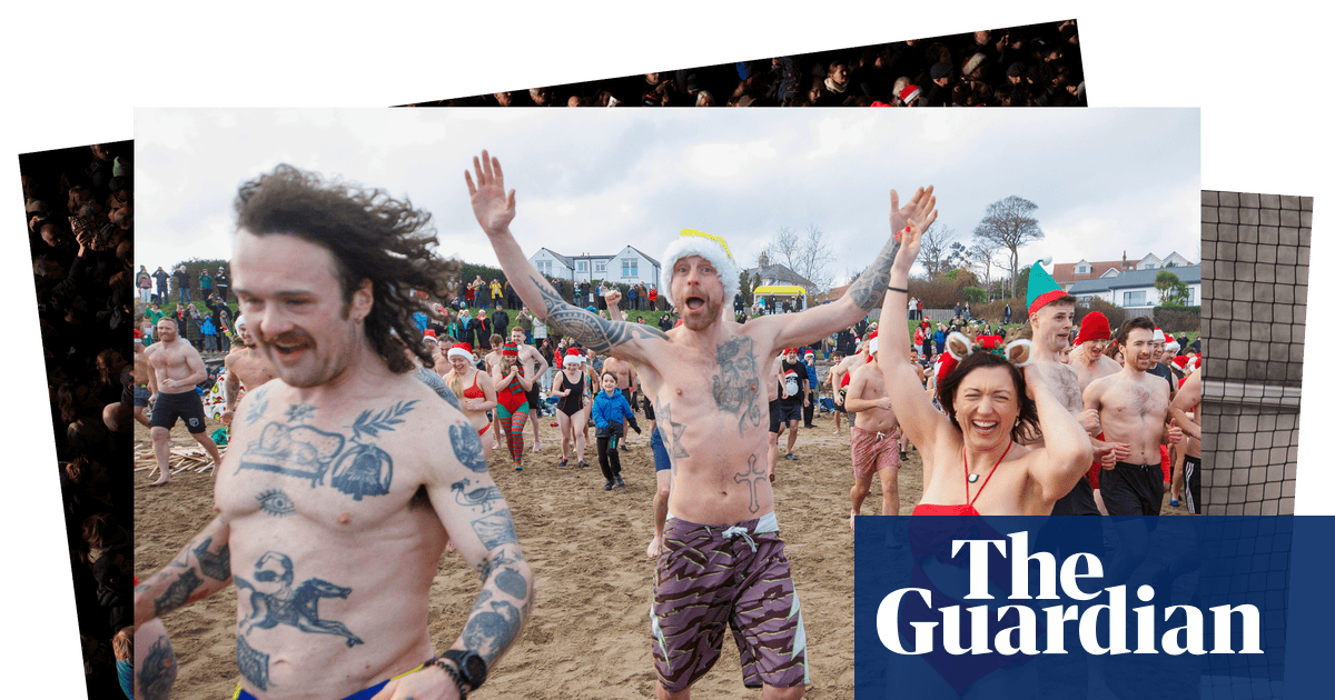 Christmas Eve swims and an underground mass: photos of the day