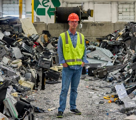 Aaron Blum, co-founder and chief operating officer at the Electronics Recyclers International facility in Fresno, California, wearing hi-vis jacket and hard hat