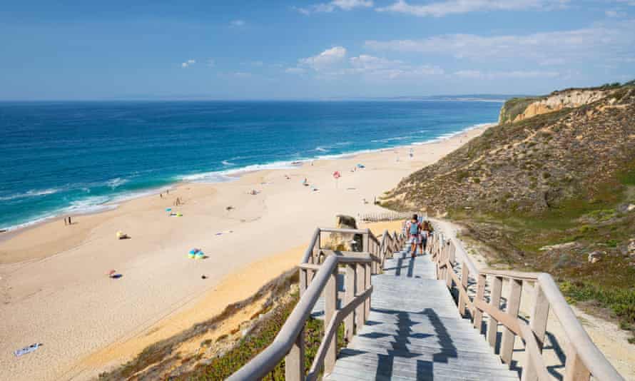 Steps down to wide, sandy Praia das Bicas