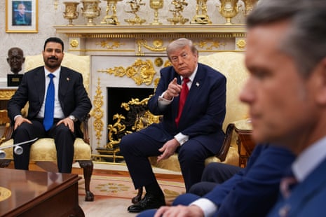 U.S. President Donald Trump (C) gestures during a bilateral meeting with the Prime Minister of Iraq, Ali al-Zaidi, in the Oval Office of the White House on July 14, 2026, in Washington, DC.