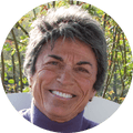 Rita-Mae-Brown, a woman smiling in portrait