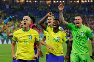 Brazil’s players including Richarlison, Vinicius Junior and Ederson celebrate after beating South Korea in the last 16.
