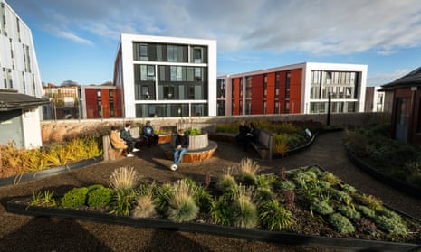 Students sit in roof garden at the Newton building at Nottingham Trent University