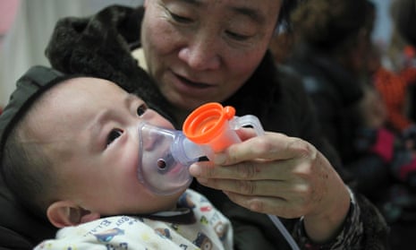A baby with respiratory disease undergoing inhalation therapy at a hospital in Beijing