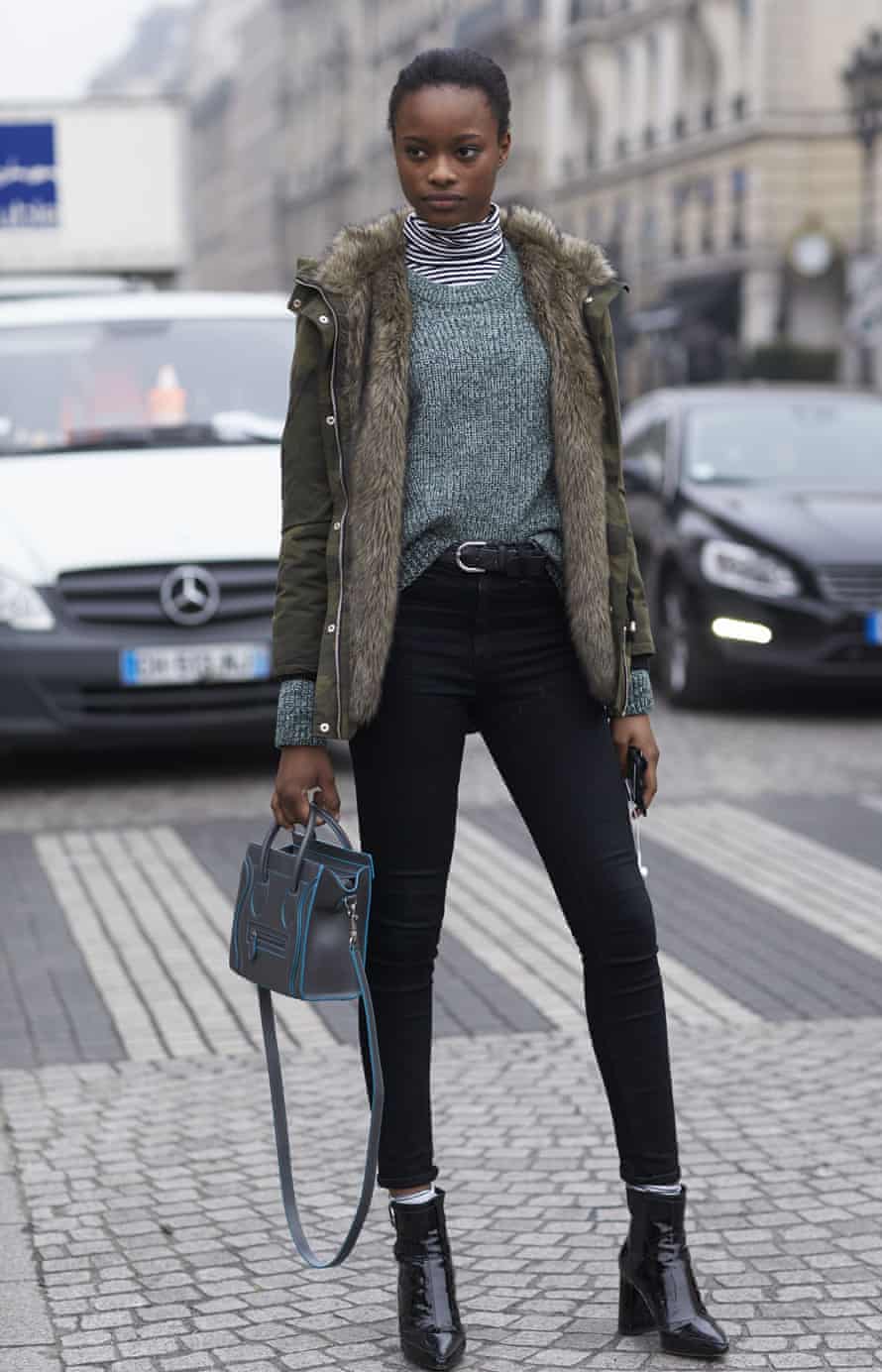A visitor to Paris fashion week, January 2017, demonstrates the navel tuck