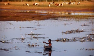 A boy fishes in the Niger river in the Mali region of Gao. Drug pollution levels are higher in much of Latin America, Africa and Asia.