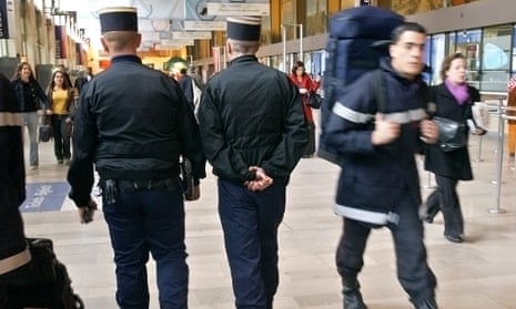 French gendarmes patrol Gare de Lyon train station in Paris.