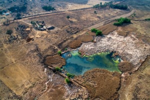 This pond situated on Rheeder’s property in Westonaria is affected by both acid mine drainage and sewage pollution. <br><br>The unnatural blue colour and the yellowish-green is a colour combination commonly found where acid mine drainage is creating such a low pH that fish and birdlife can’t survive