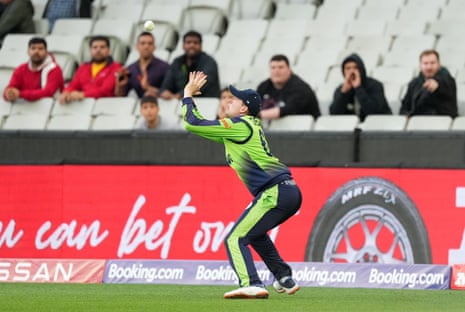Ireland's Gareth Delaney catches out England batsman Harry Brook.