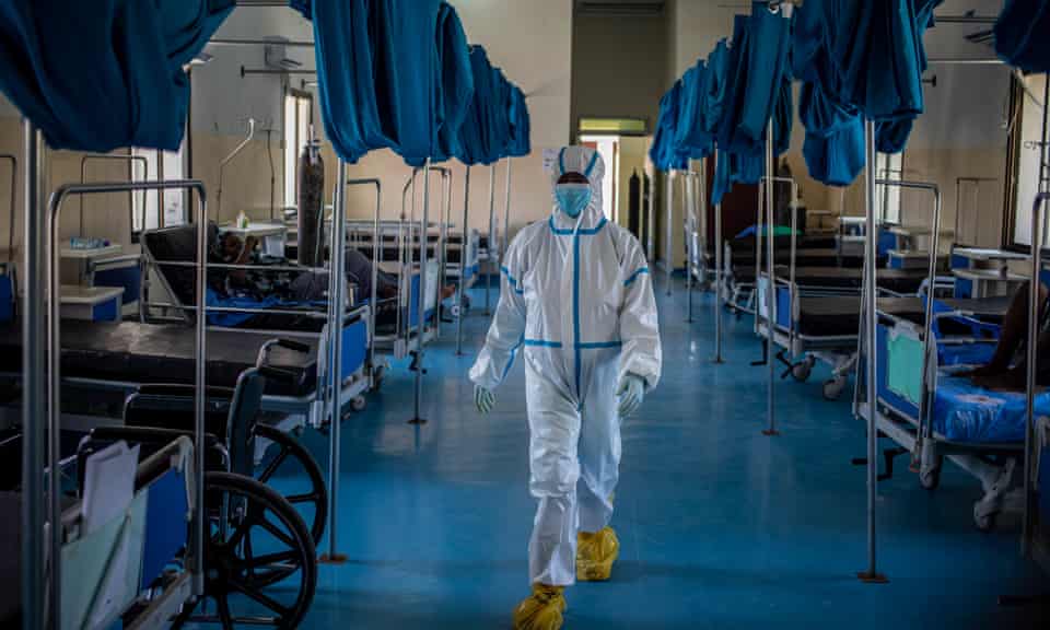 A healthcare worker is seen in the intensive care unit at De Martini hospital in Mogadishu.
