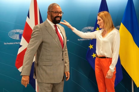 James Cleverly being greeted by the European Parliament president Roberta Metsola prior to a meeting in Brussels today.