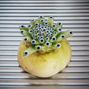 A turnip with googly eyes