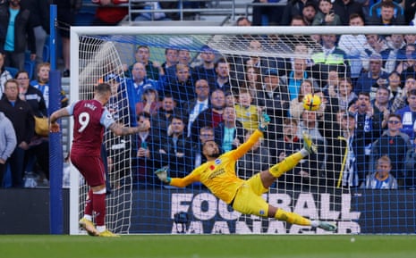 Aston Villa's Danny Ings scores their first goal from the penalty spot.
