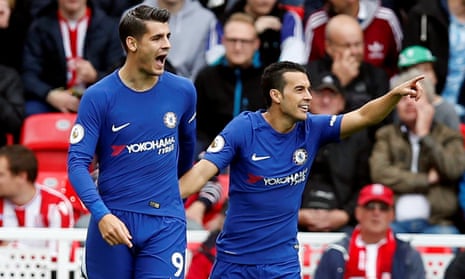 Álvaro Morata celebrates with Pedro after scoring Chelsea’s first goal against Stoke.