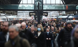 People arrive at King’s Cross station in London as all remaining legal Covid restrictions are removed in England, with people no longer legally required to self-isolate if they test positive for Covid.