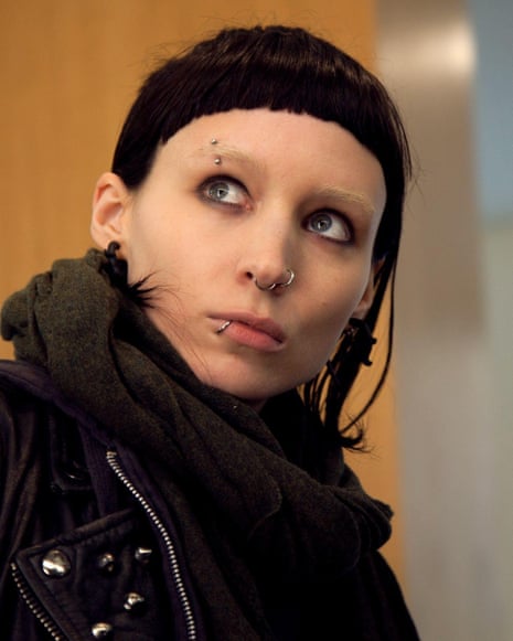 Rooney Mara in black jacket and scarf, in The Girl With the Dragon Tattoo.