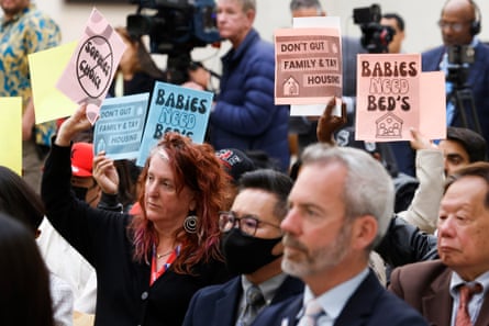 group of people holding signs