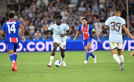 Marcos Aoas Correa in action against Brian Madjo of Aston Villa
