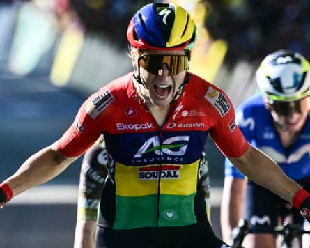 Mauritian rider Kim Le Court-Pienaar celebrates as she crosses the finish line to win the 6th stage