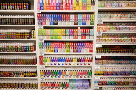 Disposable vapes and e-cigarettes on display in a shop